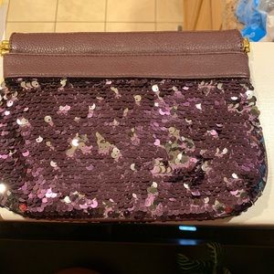 Purple sparkle clutch bag